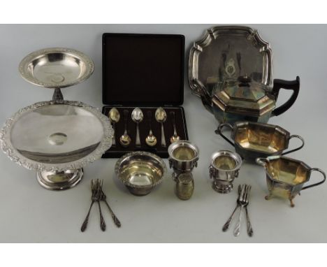 A quantity of silver-plated ware, including an interesting barrel shaped pepper by Elkington & Co., two tazzas, a three piece