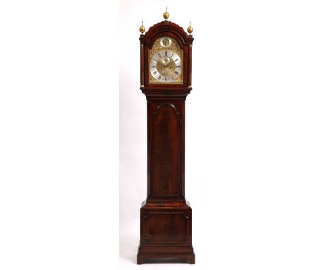 A GEORGE III MAHOGANY EIGHT DAY LONG CASE CLOCK the arching hood with brass finials and fluted pilaster columns, the trunk wi