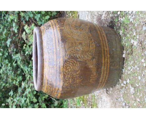 A LARGE CHINESE OVOID HONEY GLAZED PLANTER decorated with a dragon approximately 64cm diameter x 68cm high 