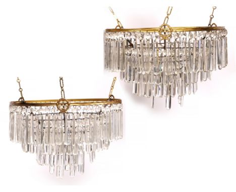 A PAIR OF OLD BRASS BOUND HANGING LIGHT FITTINGS with cut glass drops, each 41cm diameter x approximately 26cm high (2)