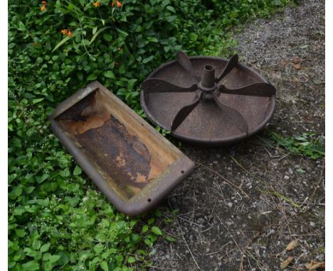 AN OLD CIRCULAR CAST IRON PIG FEEDING TROUGH 77cm diameter x 35cm high together with a further cast iron trough of rectangula