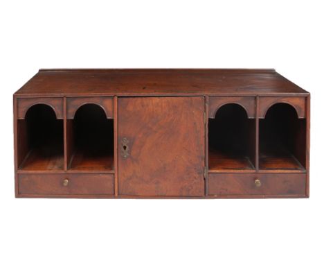 A LATE 18TH CENTURY PADAUK WOOD TABLE TOP CABINET fitted with pigeon holes and drawers either side of a central cupboard 63cm