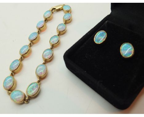 Australian 9ct gold fire opal matching bracelet and earring set