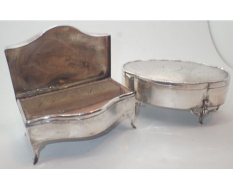 Two silver jewellery boxes 1910 and 1922 Birmingham one decorated with punch points and engine turning with Art Nouveau feet 