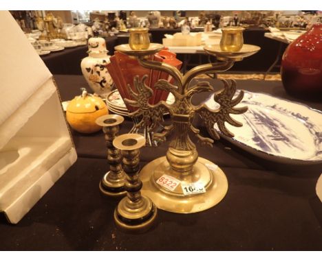 Large brass double sconce candle holder double headed eagle design and a pair of Art Deco brass candlesticks