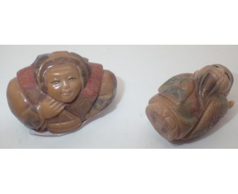 Two Netsuke of a woman and a man 
