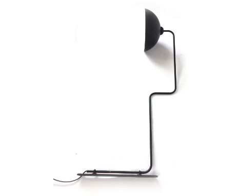 A 1950's black metal wall light, the cantilever arm supporting a matching shade and a matching spare shade CONDITION REPORT: 