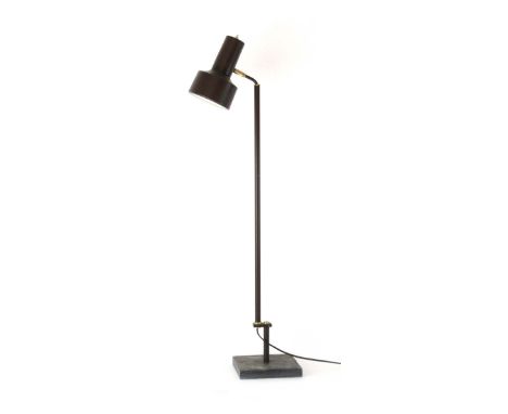 A 1970's brown enamelled standard lamp with an adjustable shade CONDITION REPORT: Working order unknown, lead cut. Some wear.