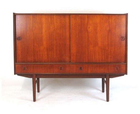 A 1960/70's highboard with an arrangement of two sliding doors enclosing shelves and two fitted drawers over a pair of extern