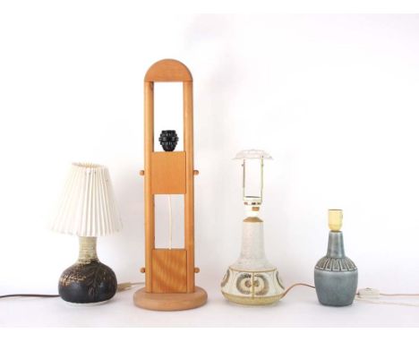 A group of four table lamps including a +Lys Danish beech lamp, a Soholm Swedish ceramic lamp base and two others 