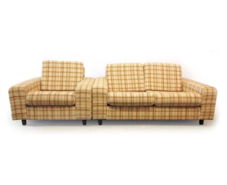 A 1970's striped cloth two seater sofa together with a matching armchair on mahogany feet