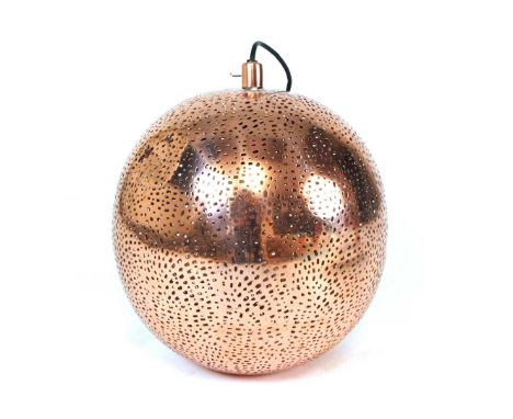 A copper coloured pierce-work ceiling light of spherical form