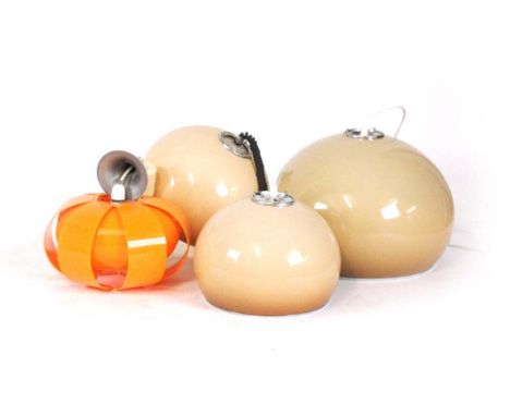A group of lighting including a 'burnt orange' pull-down ceiling light, matching ceiling lights and an orange moulded perspex
