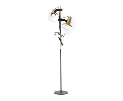 A 1970's brass coloured standard lamp with two adjustable shades on a black shaft and base CONDITION REPORT: Working order un
