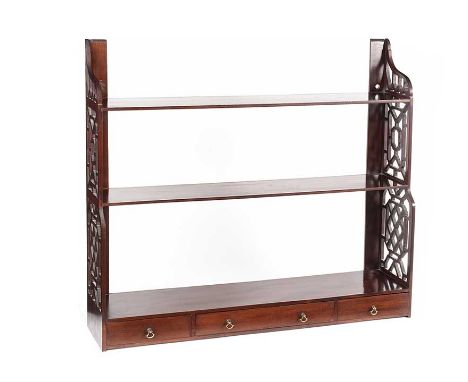 ANTIQUE MAHOGANY WALL BRACKET WITH FRETWORK SIDES FITTED WITH THREE DRAWERS WITH BRASS DROP HANDLES.HEIGHT: 28 INCHES.WIDTH: 