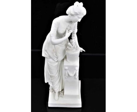 A Derby bisque figure of a female gardener, late 18th/early 19th century, shown tending to a potted plant standing on a plint