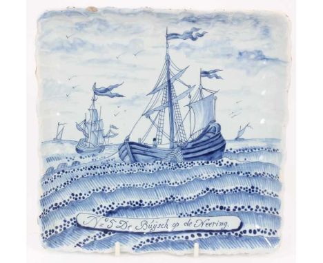 A late 18th century Dutch blue and white delftware plaque, painted with fishing boats and bearing the inscription 'No 5 De Bu