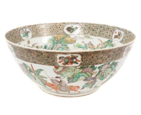 A large late 19th century Chinese famille verte porcelain punch bowl, decorated with figural scenes, 38.5cm diameterSome enam