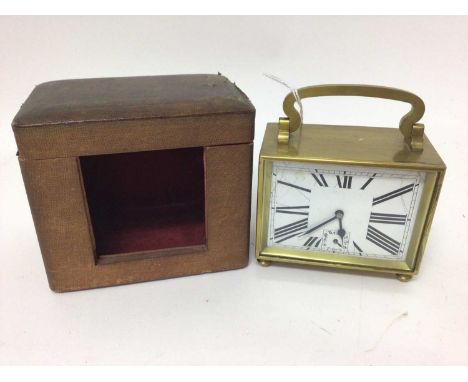 Art Deco-style carriage clock with enamel dial in brass case, striking movement on bell, 11.5 cm high in carrying case