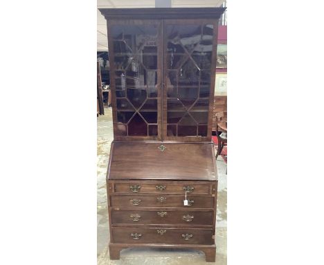 George III mahogany bureau bookcase, with cavetto moulded cornice and enclosed by pair of astragal glazed doors, the base the