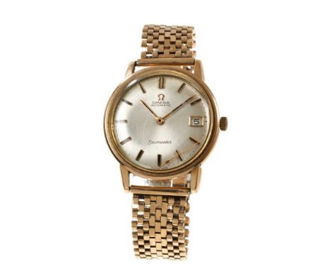 1960s gentlemen's 9ct gold Omega Seamaster automatic wristwatch with silvered dial with date aperture and gilt baton numerals