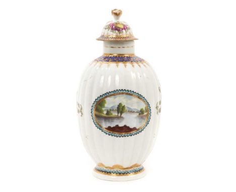 A Worcester fluted porcelain tea caddy and cover, circa 1780, of Dalhousie type, painted with a landscape panel, sprays of fr