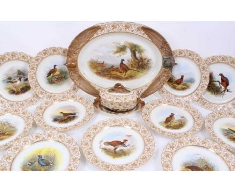 A Royal Worcester Vitreous dinner service, finely painted with game birds, including a platter with moulded bird head handles