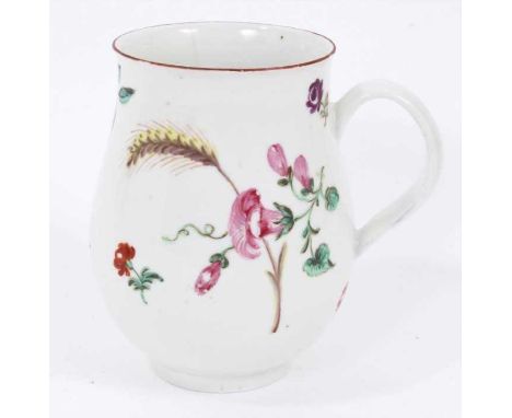 A Bristol barrel shaped mug, circa 1770, polychrome painted with floral sprays and a stem of wheat, red-lined rim, crossed sw