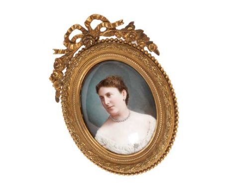Fine quality 19th century enamel portrait miniature, the quarter-length female oval portrait, signed verso 'Walery London and
