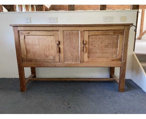 Arts and Crafts oak sideboard with twin cupboard doors, on square legs joined by stretchers, 158cm wide x 51cm deep x 96cm hi