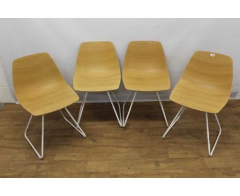 Set of four Lapalma sled base bent ply chairs designed by Antti Kotilainen,