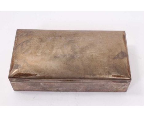 Early 20th century German silver cigarette box of rectangular form with engraved presentation inscription to lid 'K. H. G. fr