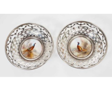 Pair unusual George V pierced silver bon bon dishes with inset Royal Worcester porcelain plaques painted by James Stinton wit
