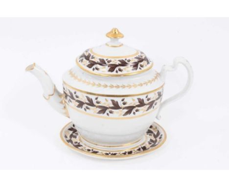 A Worcester oval teapot, cover and stand, circa 1800, enamelled and gilt with foliate patterns, the teapot measuring 25cm fro