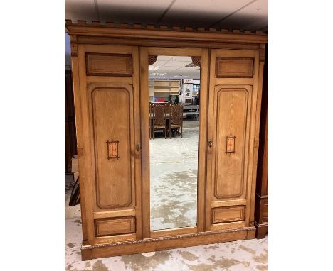 Good quality Edwardian ash bedroom suite comprising, triple wardrobe, dressing table and mirror and bedroom chair, each inlai