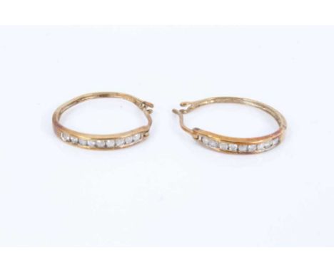 Pair of diamond hoop earrings with brilliant cut diamonds in 9ct yellow gold channel setting, estimated total diamond weight 