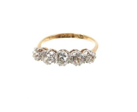 Antique diamond five stone ring with five graduated old cut diamonds in platinum claw setting on 18ct yellow gold shank. Esti