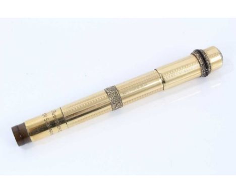 Vintage Waterman's fountain pen in 18ct rolled gold case with engine turned decoration and presentation inscription to 'J Rus