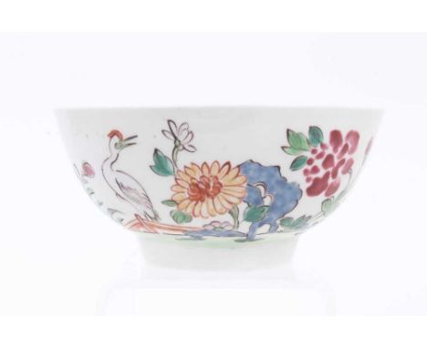 A Liverpool round bowl, circa 1760, finely decorated in the Chinese famille rose style with a crane amongst flowers, 12cm dia