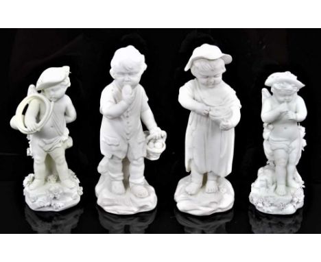 A small pair of Derby bisque children, late 18th/early 19th century, the boy eating an apple from a basket at his side, a bar