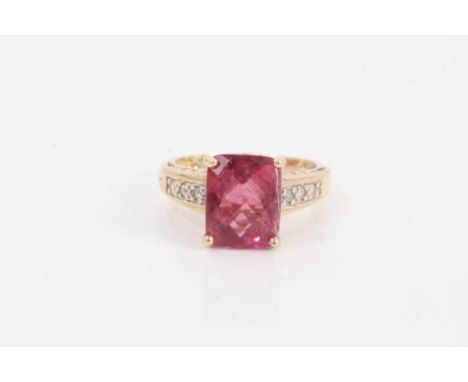 Pink tourmaline and diamond ring with a rectangular fancy mixed cut pink tourmaline estimated to weigh approximately 3.7cts i