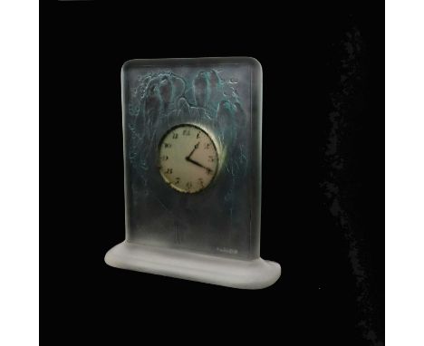 Rene Lalique, a Six Hirondelles Perchees glass clock, model 763, designed circa 1920, frosted and blue stained, relief moulde