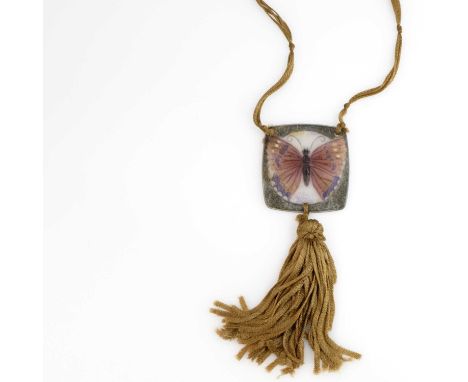 Gabriel Argy Rousseau, a pate de verre Butterfly glass pendant, model 24.37, designed circa 1924, on beige silk knotted ribbo
