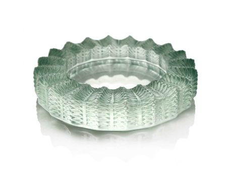Rene Lalique, a Jamaique glass ashtray, model 296, designed circa 1928, polished and frosted with green staining, etched mark
