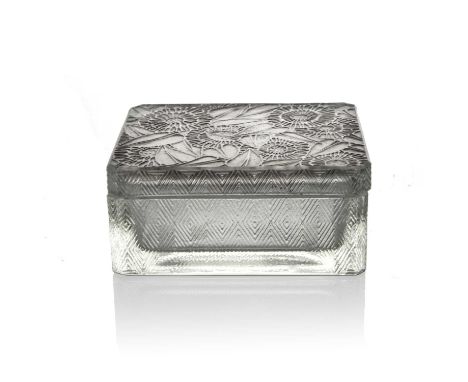 Rene Lalique, a Zinnias glass box, model 54, designed circa 1923, polished and frosted with black staining, incised mark to l