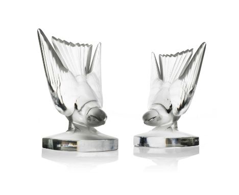 Rene Lalique, a pair of Hirondelle B glass bookends, model 1143-B-Bookends, designed circa 1942, frosted and polished, etched