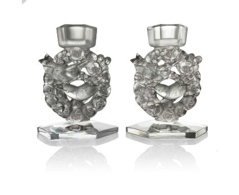 Rene Lalique, a pair of Mesanges glass candlesticks, model 2126-B, designed circa 1943, polished and frosted, with black stai