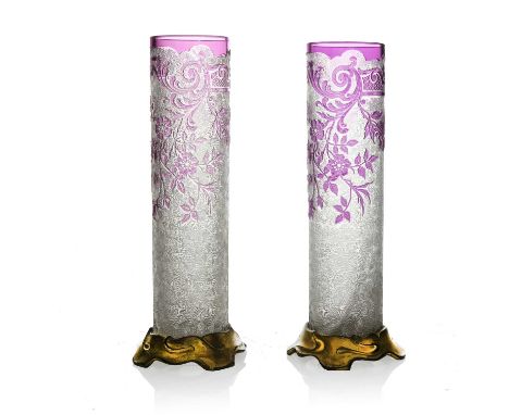 Baccarat, a pair of cameo engraved glass vases, circa 1900, cylindrical form, ruby over colourless, engraved with trailing do
