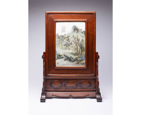 A CHINESE PORCELAIN TABLE SCREEN LATE QING DYNASTY/ 20TH CENTURY Set with a rectangular panel painted with a mountainous land