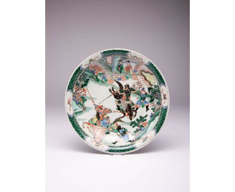 A CHINESE FAMILLE VERTE DISH 19TH CENTURY Painted with equestrian warriors and two bannermen before spectators, the reverse w